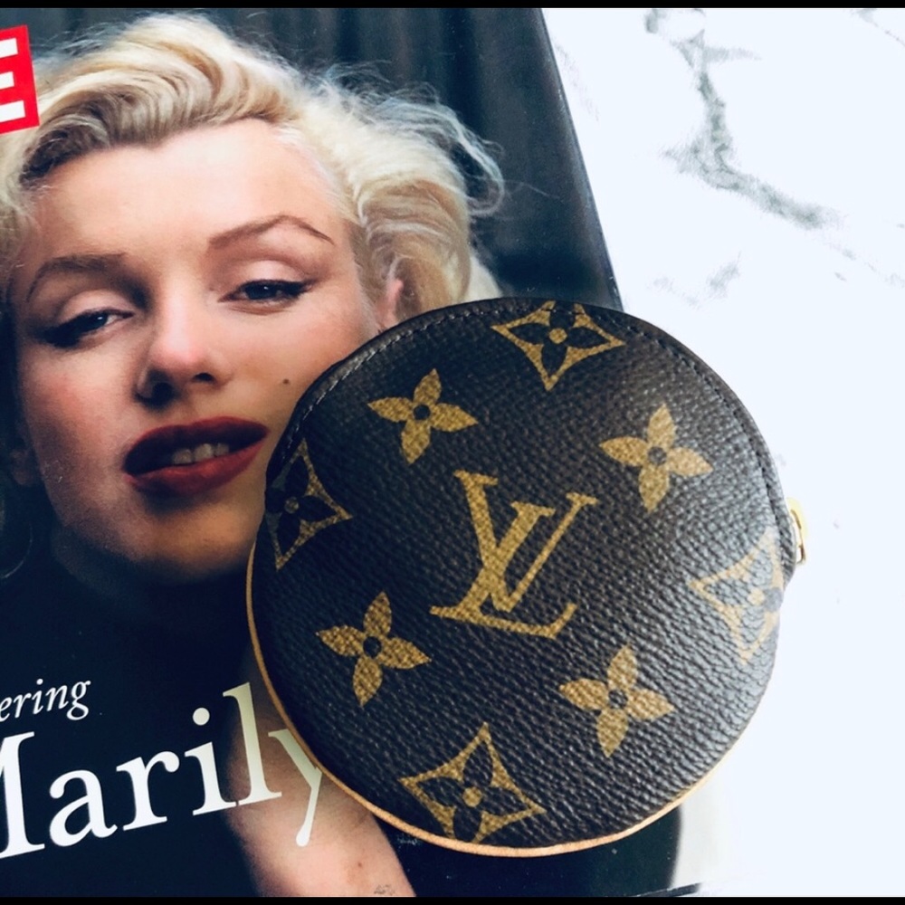 Louis Vuitton round zippy coin purse